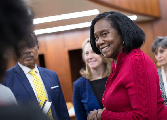 Law professor Marilyn Ford smiling at event