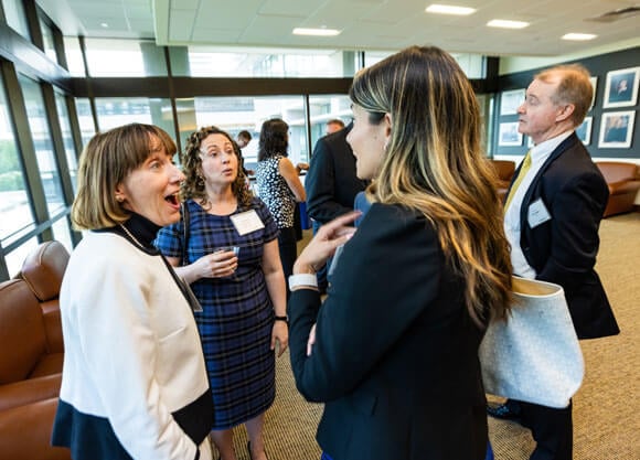 Quinnipiac School of LAw Alumni mingling together