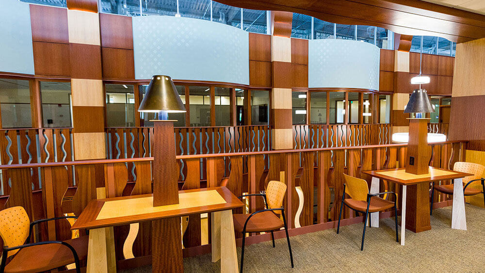 Rows of chairs, tables and lamps for studying and reading in the School of Law Center