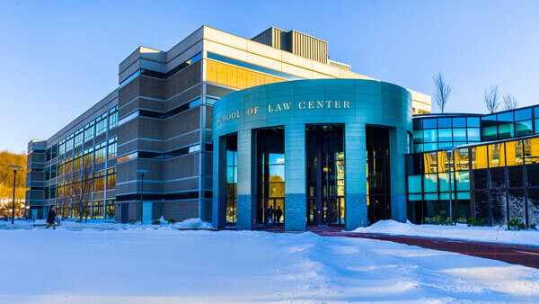 Outdoor view of the Quinnipiac School of Law Center on a bright winter day