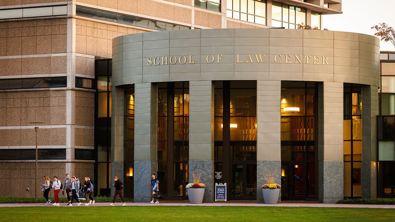 The outside of Quinnipiac's Law School during sunset.